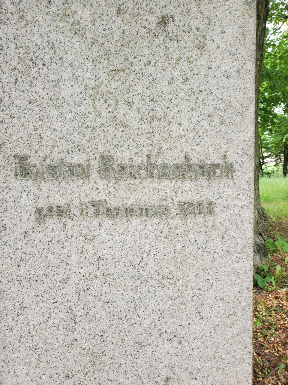 Present-condition photograph of the German inscription naming Gustav Reichenbach and his death on 19 June 1928