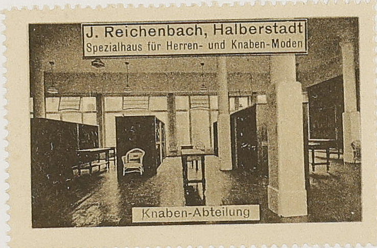 Original institutional scan crop of the J. Reichenbach advertising stamp captioned Knaben-Abteilung