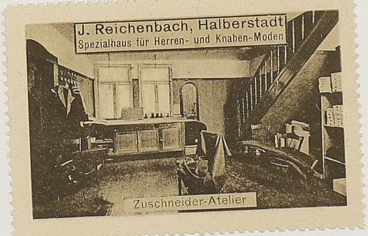 Original institutional scan crop of the J. Reichenbach advertising stamp captioned Zuschneider-Atelier