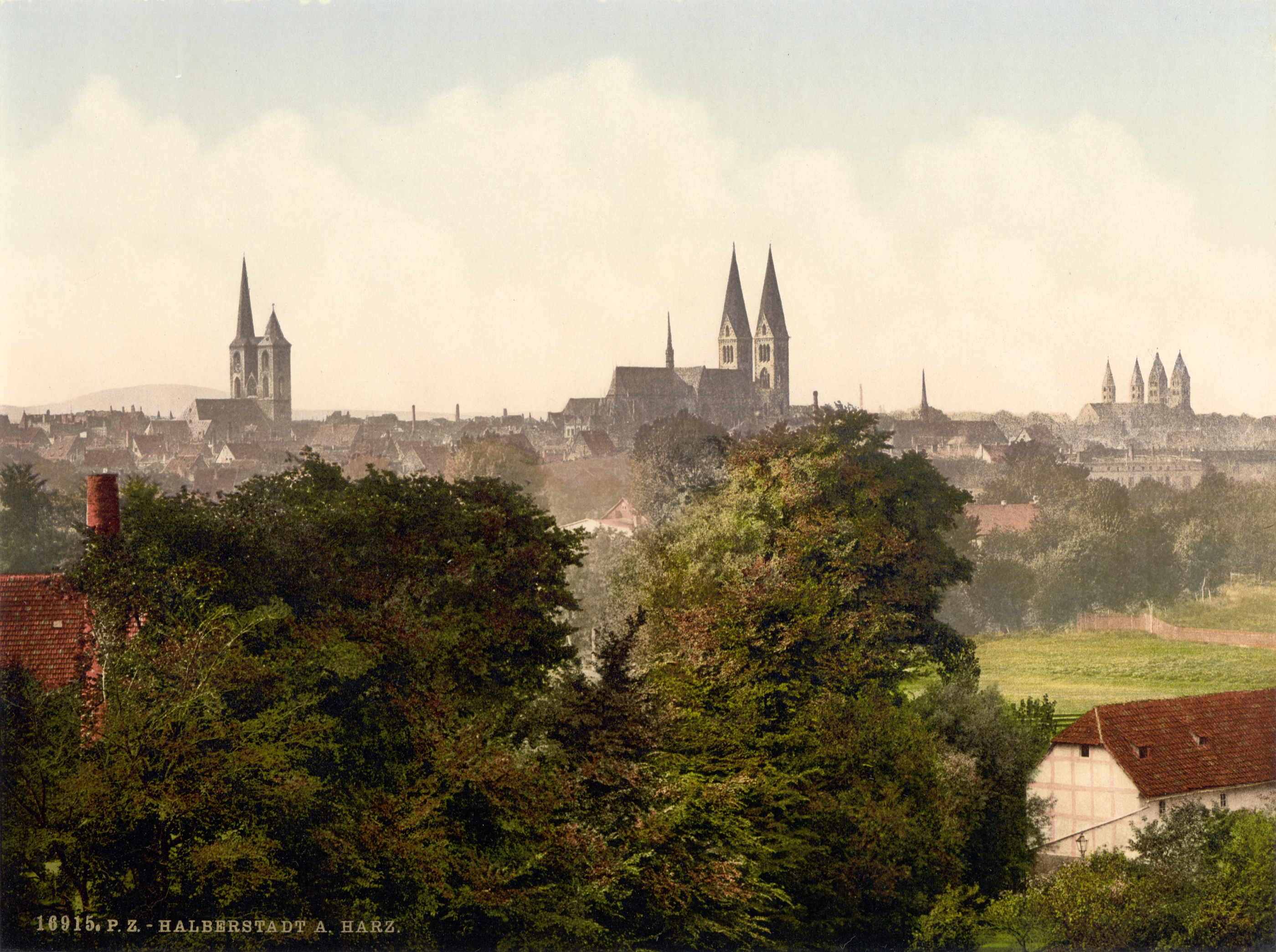 Color photochrom panorama of Halberstadt around 1900, with red roofs, church towers and the Harz landscape