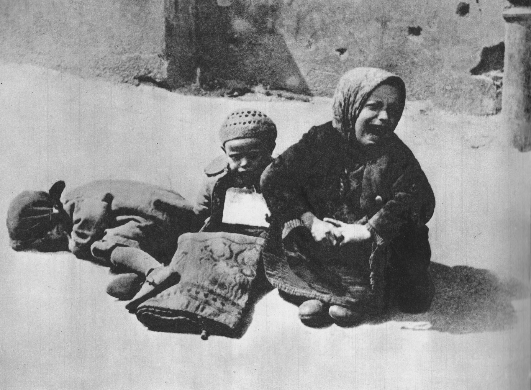 Homeless children in a street of the Warsaw ghetto in 1941.
