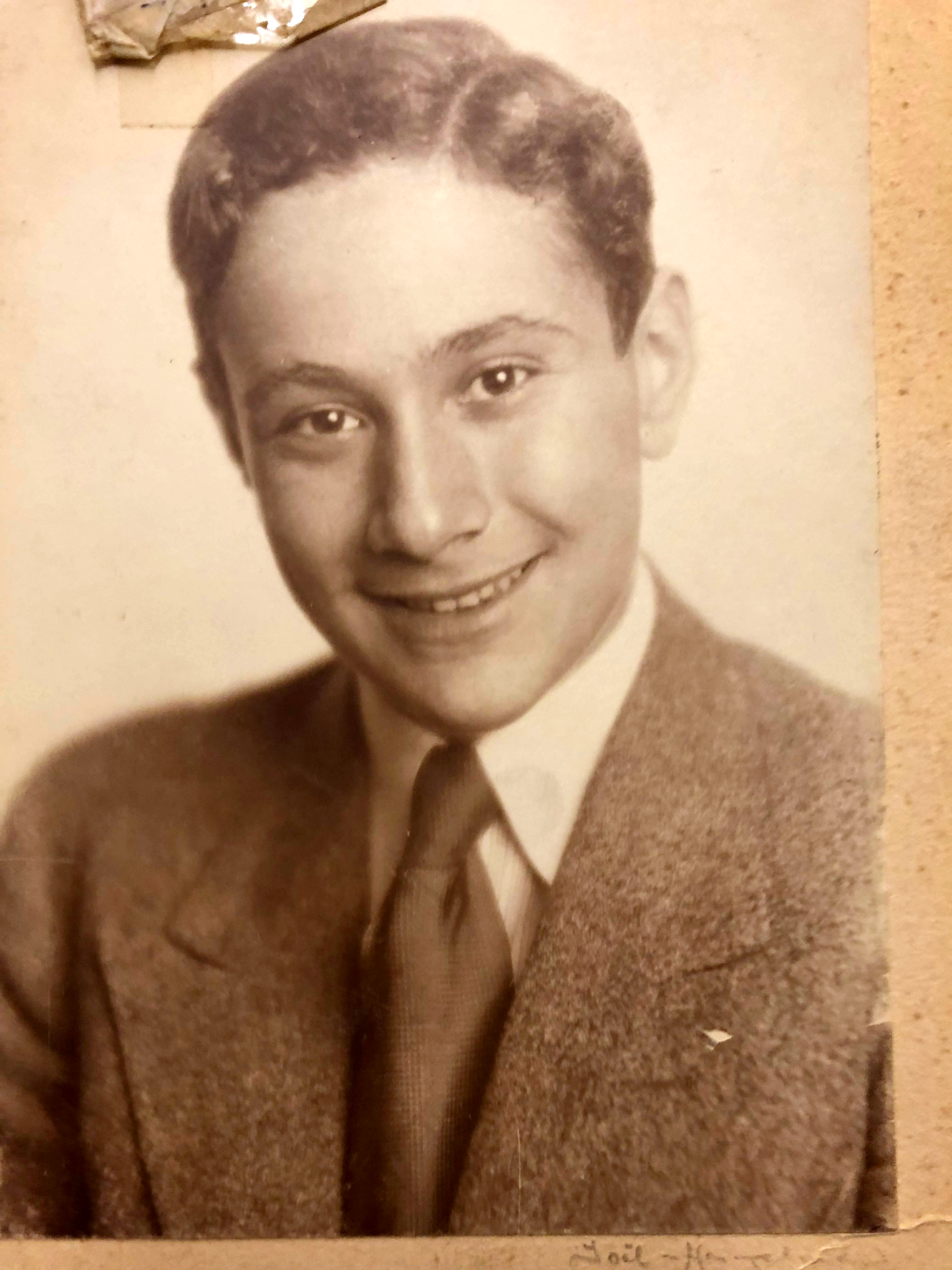 Smiling studio portrait of Adolf “Dolf” Reichenbach as a young man