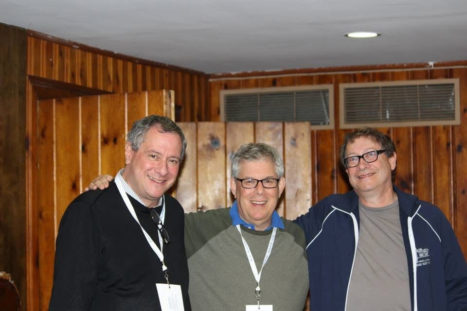 Paul J. Reichenbach, Rabbi Danny Freelander and Loui Dobin standing together indoors